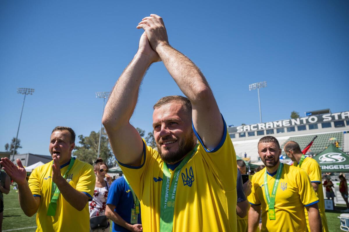 Ukraine men’s player Denkovych Pavlo raises his arms to thanks supporters on the final day of the Homeless World Cup on Saturday, July 15, 2023, at Sacramento State’s Hornet Stadium.