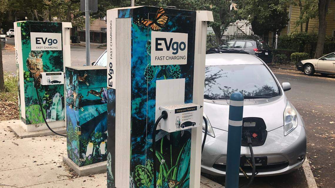 A curbside electric vehicle charging station is seen in Sacramento in October 2021. If approved by voters, Proposition 30 would tax California’s richest residents to pay for expanded electric vehicle and wildfire infrastructure.