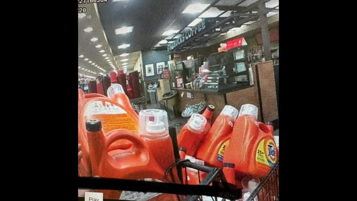 A man accused of murder was arrested after trying to steal a shopping cart full of laundry detergent, California authorities said. 