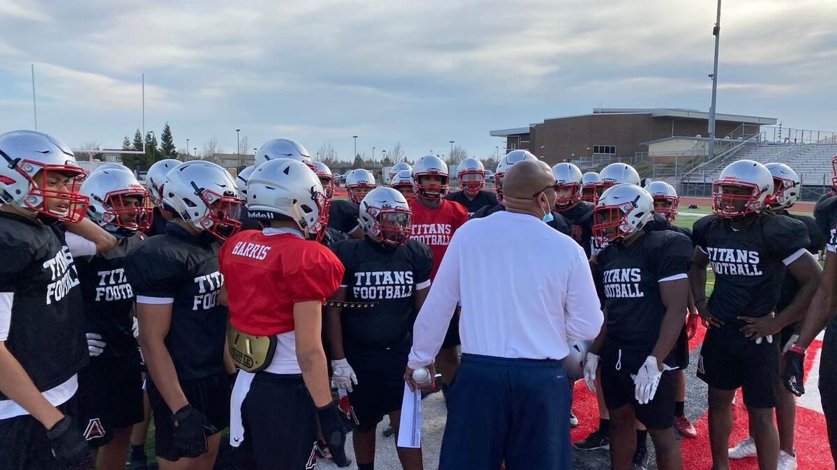 Antelope first-year head coach Reggie Harris talks to his team at practice on Thursday. Harris was a long-time assistant at Grant and was recently at Florida powerhouse St. Thomas Aquinas.