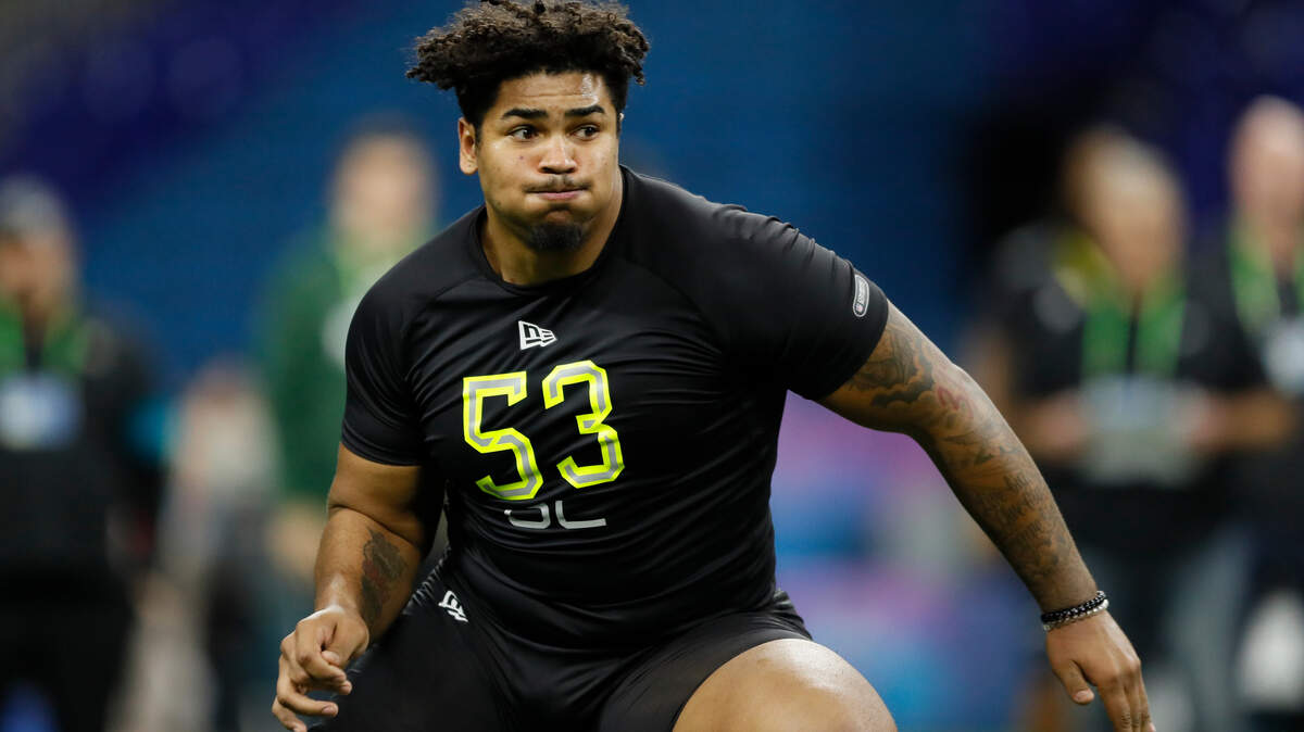 Iowa offensive lineman Tristan Wirfs runs a drill at the NFL football scouting combine in Indianapolis.