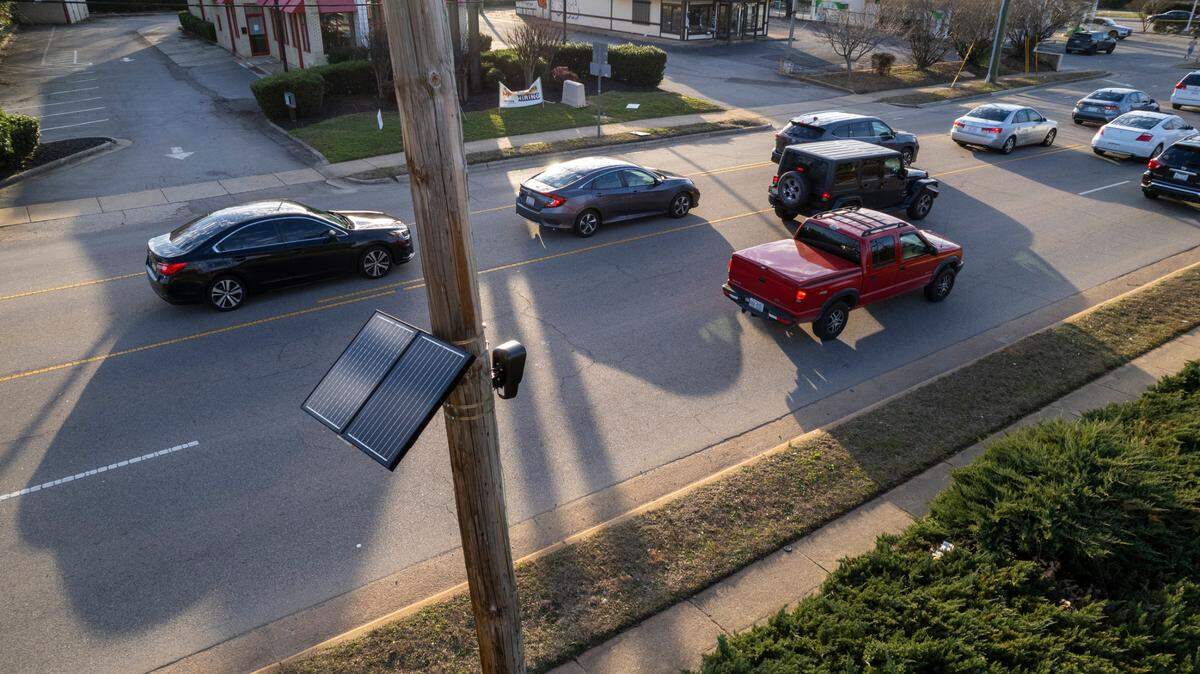 A Flock automated license plate reader camera used by the Raleigh Police Department is mounted on a Duke Energy utility pole on Hillsbourough Street in Raleigh on Tuesday, Jan. 29, 2023. RPD operates 25 automated readers that collect license plate and vehicle information including color, make, model and bumper sticker details on around 400,000 vehicles per month.