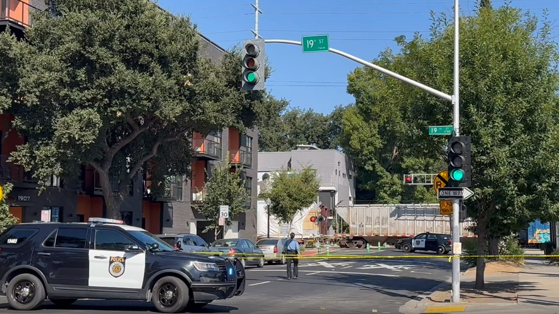 Officers respond to a pedestrian fatality near Powerhouse Alley between 19th and 20th streets in midtown Sacramento on Monday, Aug. 7, 2023.