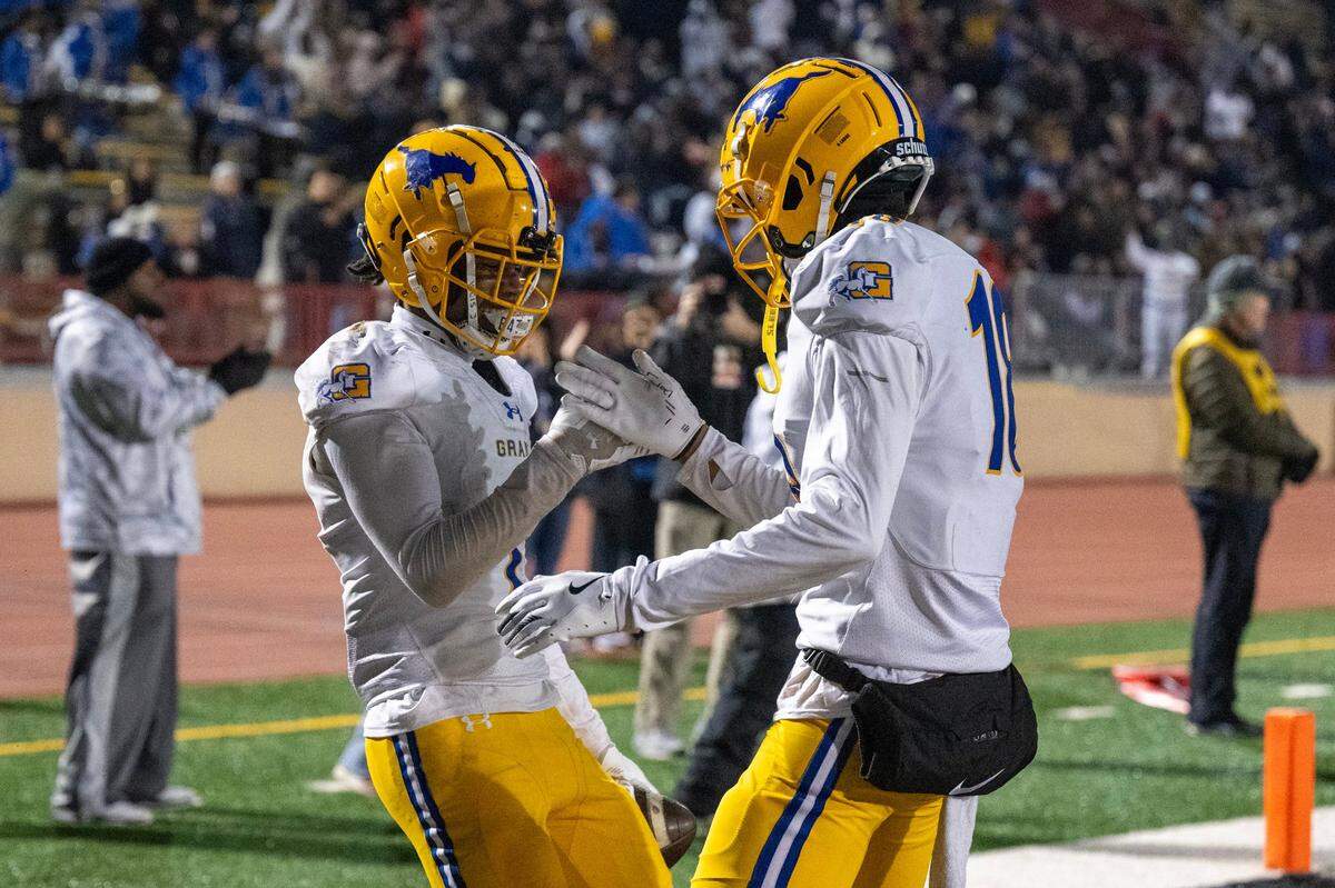 The Grant Pacers’ WR Brandon Lambert (1) celebrates with WR Zo Edwards (18) in the first half following a touchdown in the 2024 CIF Sac-Joaquin Section Football Championship against the Rocklin Thunder on Friday, Nov. 29, 2024 in Sacramento. Grant will face Folsom on Aug. 22 to open the 2025 season.