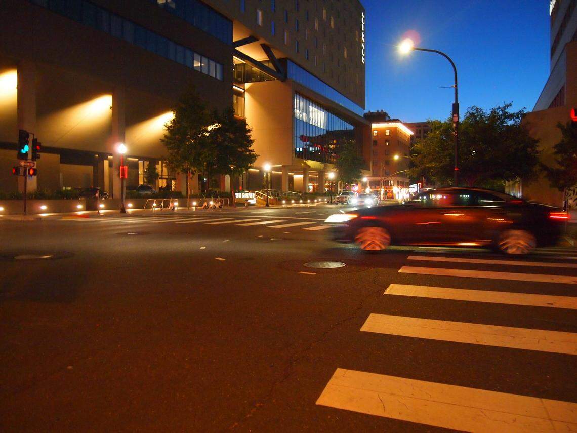 A car takes a left from Sixth Street onto J Street on June 12, 2025.