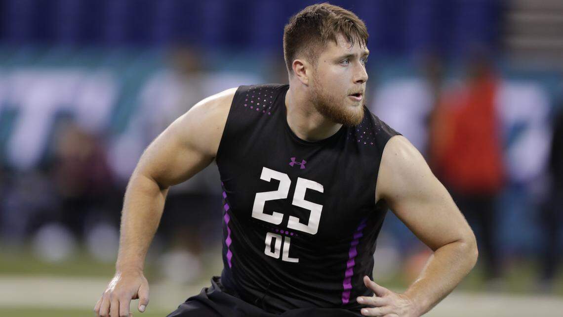 UCLA offensive lineman Kolton Miller runs a drill at the NFL scouting combine in Indianapolis on March 2, 2018.