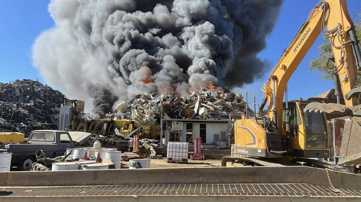 Fire agencies are trying to contain a fire at a metal recycling facility west of Yuba City on Saturday, June 25, 2022.