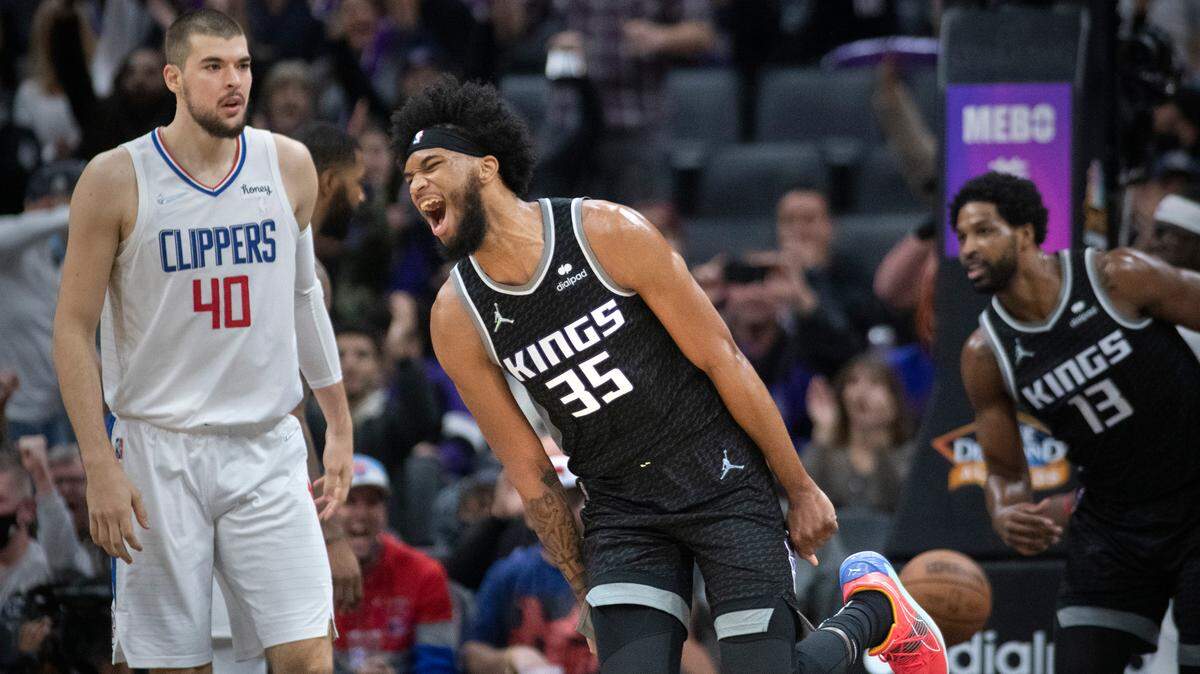 Sacramento Kings forward Marvin Bagley III (35) reacts after scoring against the Los Angeles Clippers during the second half of an NBA basketball game in Sacramento, Calif., Saturday, Dec. 4, 2021. The Kings won 104-99. (AP Photo/Randall Benton)