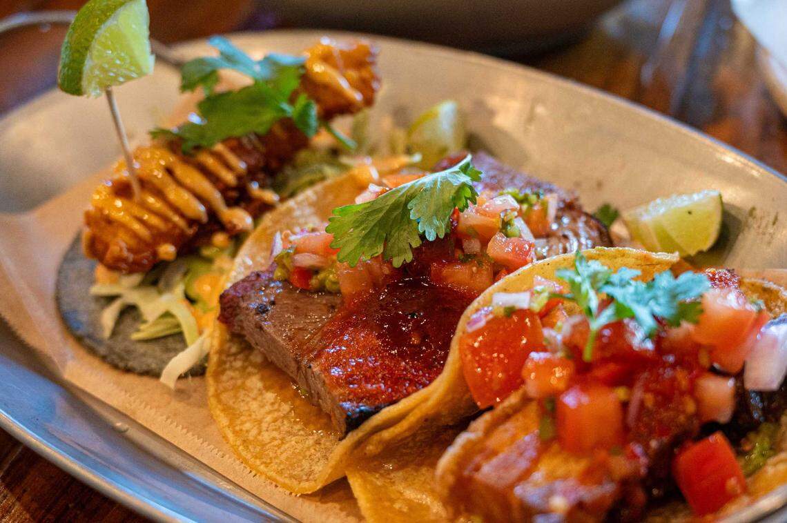 Fish, brisket and chicharron tacos are available at StreetZlan in Elk Grove on Wednesday.