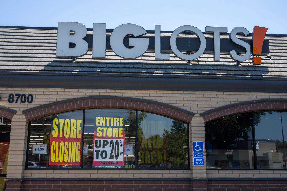 Store closing signs are posted in the window of Big Lots store in Sacramento County’s La Riviera community on Monday, July 22, 2024.