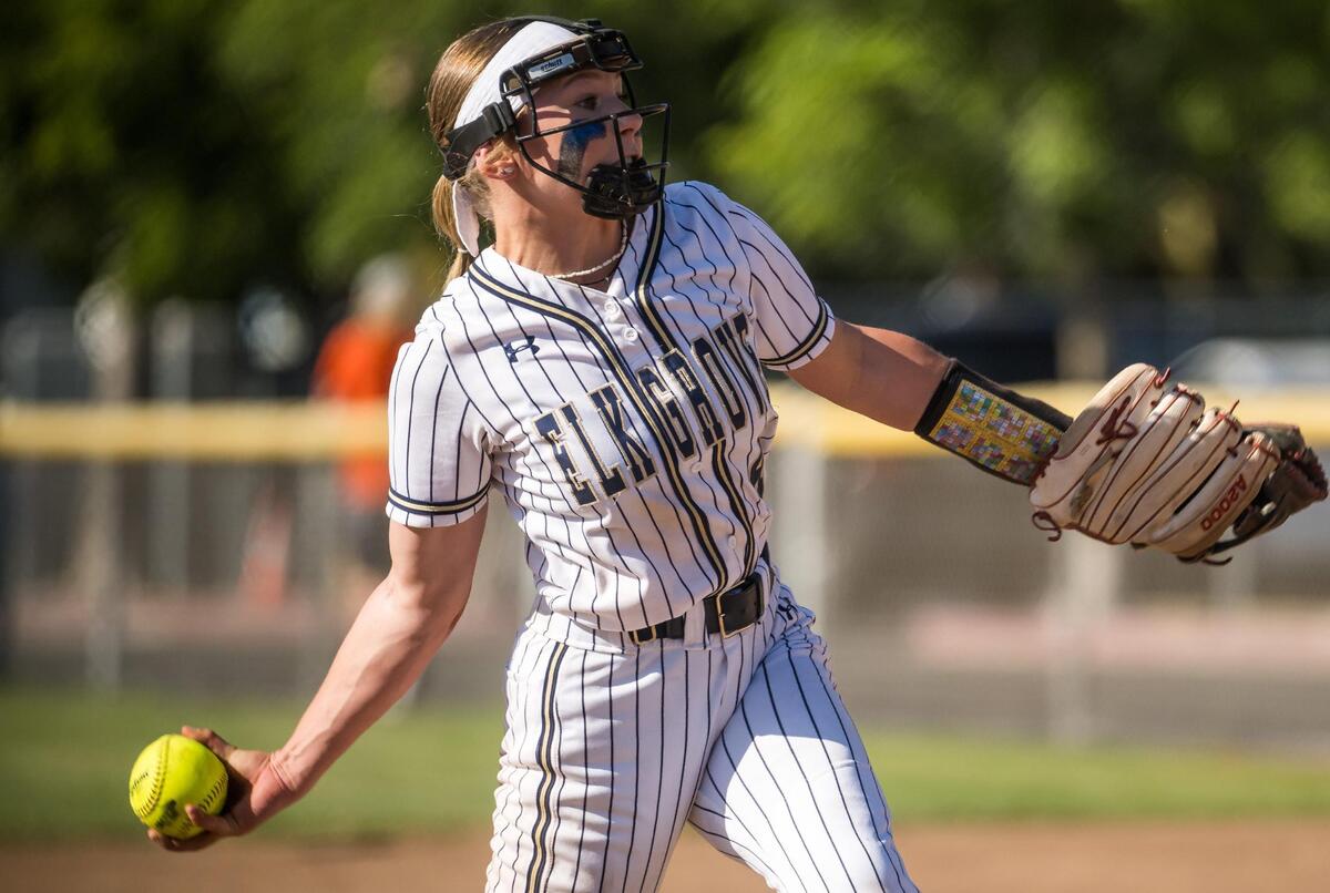 The Elk Grove Thundering Herd’s Madison Carda (4) pitches against Rodriguez (Fairfield) during the sixth inning at the high school girls softball CIF Sac-Joaquin Section Division II first round playoff game Tuesday, May 16, 2023, at Elk Grove High School. The Thundering Herd beat the Mustangs 8-1 to advance to the quarterfinals.