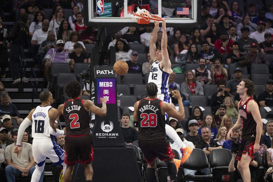 Sacramento Kings center Maxime Raynaud (42) dunks during a game at Golden 1 in Sacramento on Sunday, March 8, 2026.