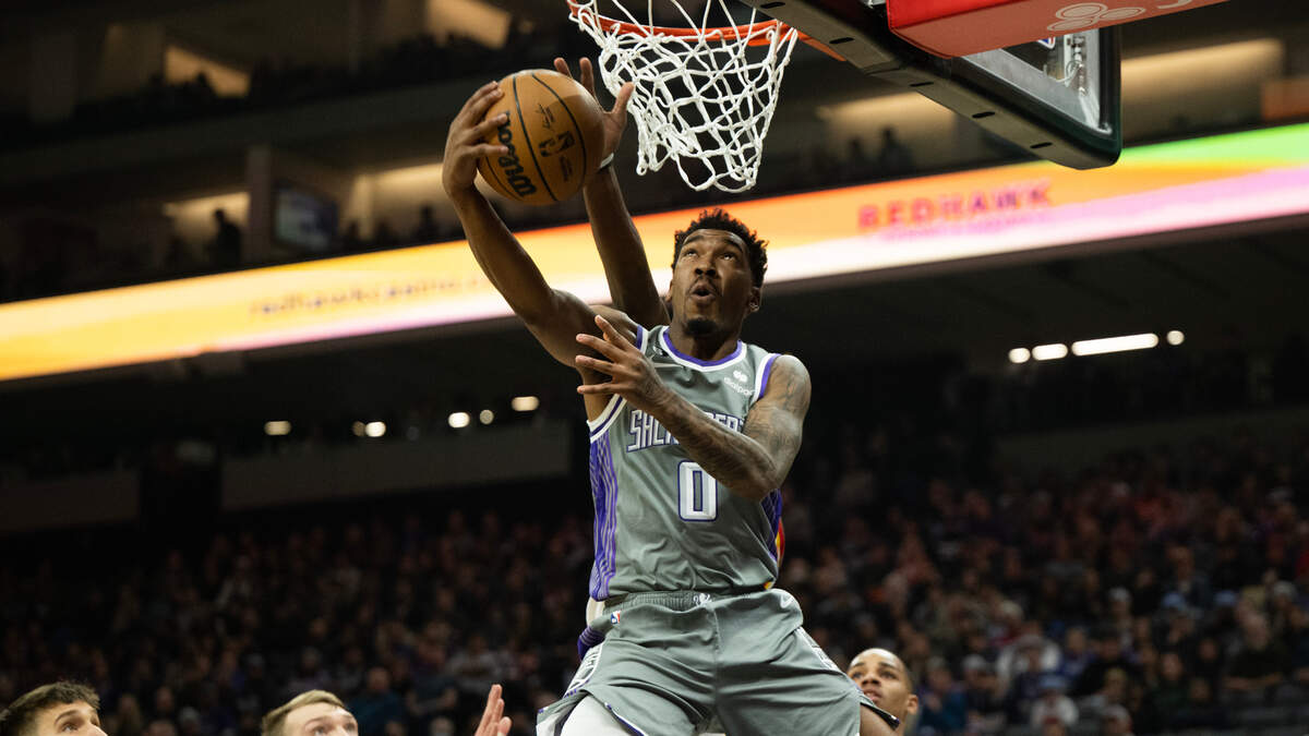 Sacramento Kings guard Malik Monk (0) reverse dunks the ball during a game at Golden 1 Center in Sacramento, Wednesday, Jan. 4, 2023.