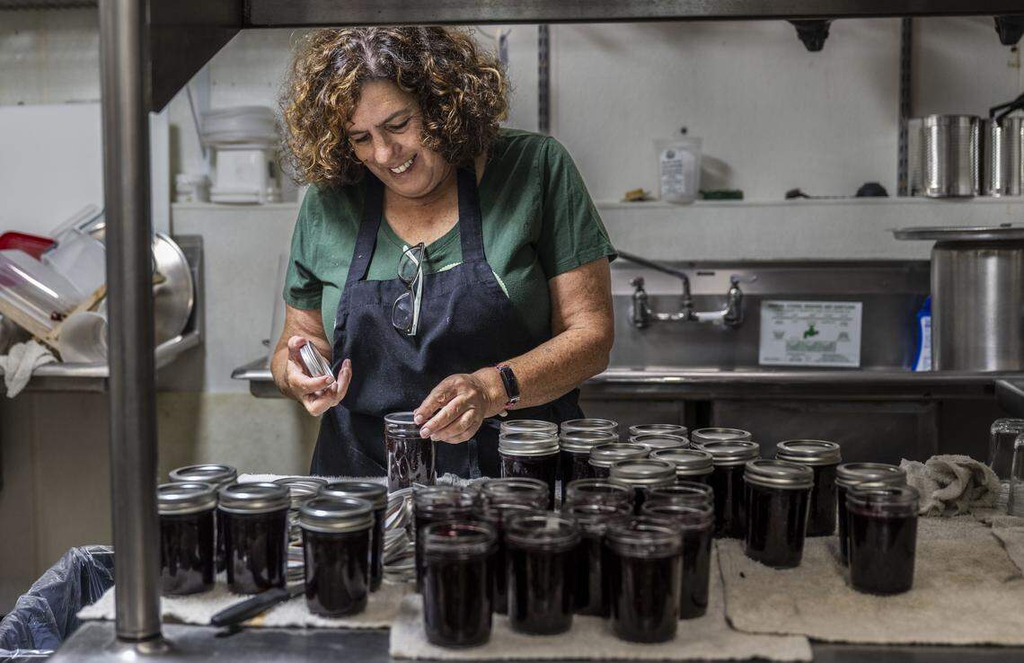 Ozzie Chavez, former owner of the Paisley Cafe in Orangevale, cans blueberry lavender jam on Tuesday, July 22, 2025, in a kitchen in Carmichael. Chavez said she had to sell her cafe because of the financial improprieties of the Dine-In 2 program.