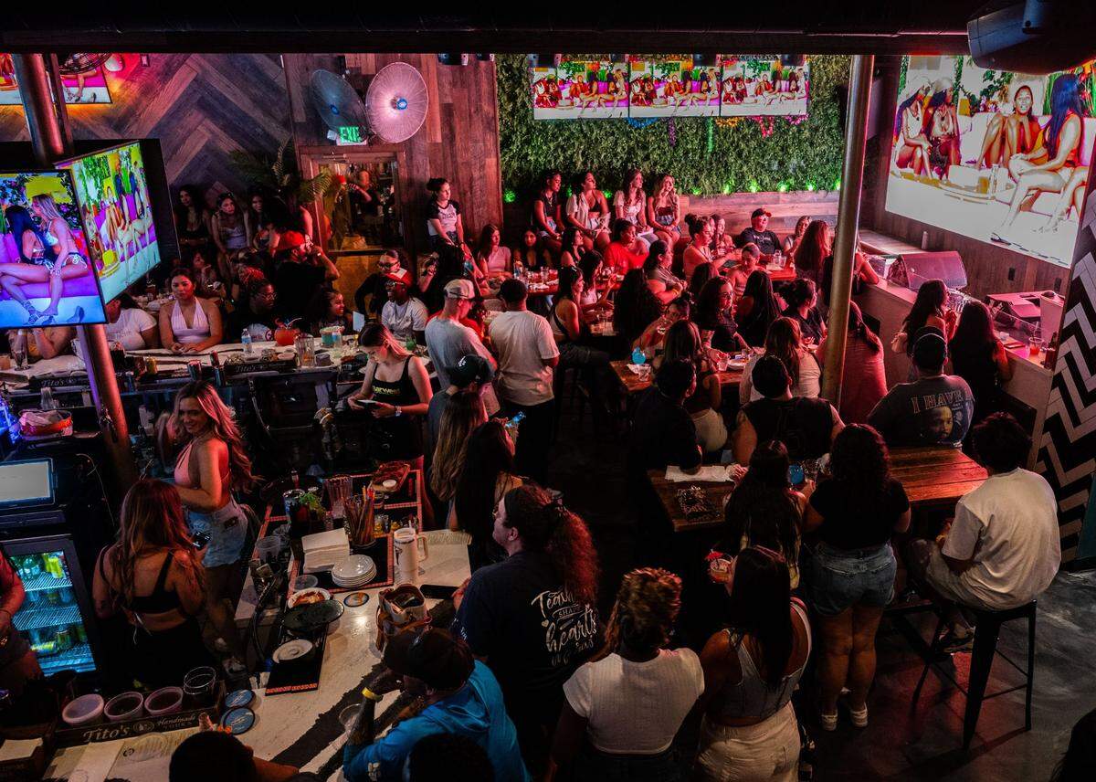 A crowd of bar-goers attend the Love Island watch party hosted at Barwest on July 9, 2025.