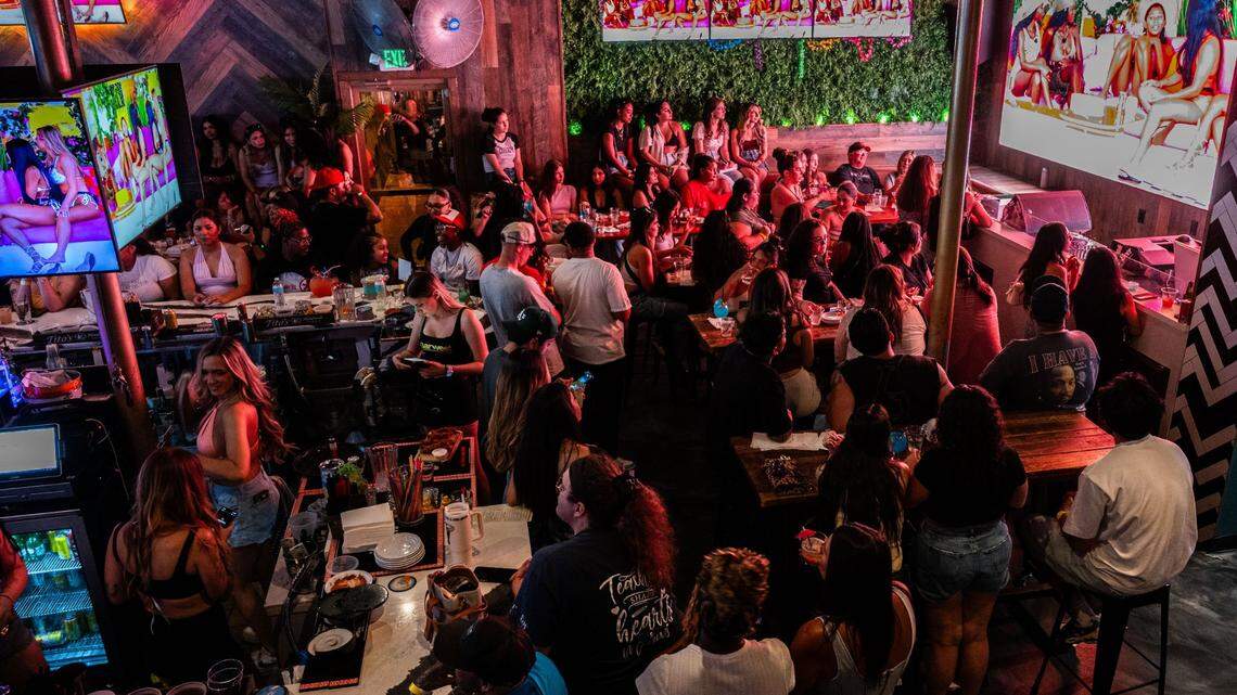 A crow of bar-goers attend the Love Island watch party hosted at Barwest on July 9, 2025.