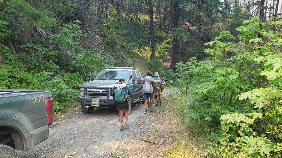 At least 60 hikers were evacuated from the Pacific Crest Trail on Saturday, July 30.