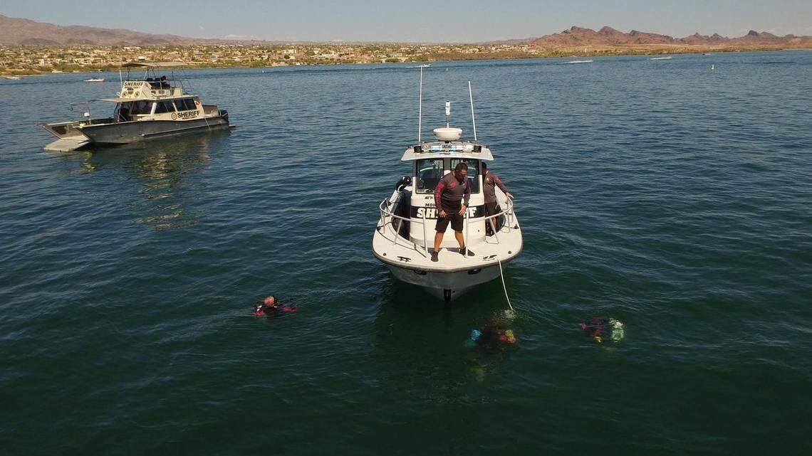 Divers search for a 24-year-old man who drowned at Lake Havasu after jumping off a 20- to 30-foot cliff into the water.