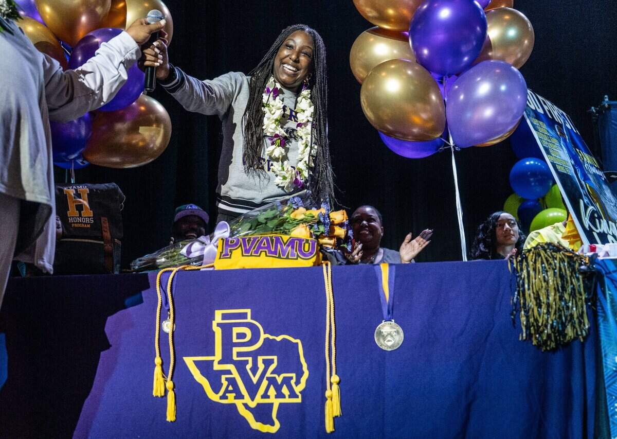 Grant High School basketball center Samaya Dillard smiles Wednesday after talking about signing her letter to attend at Prairie View A&M University on an academic and athletic scholarship.