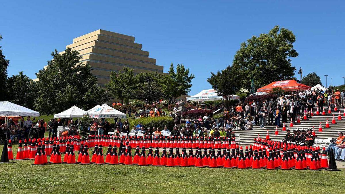 One hundred and ninety-five orange traffic cones were placed in a diamond shape in the middle of the California Department of Transportation’s 36th annual workers memorial event on April 23, 2026. Each cone represents a California highway maintenance and construction worker that has died on the job since 1921 — when the first death was recorded. For this year’s memorial, one more orange traffic cone was added the diamond formation to represent the loss of Mahdi Khorram, a Caltrans District 4 transportation engineer.