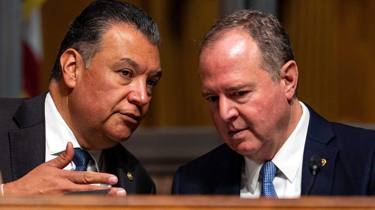 Sen. Alex Padilla, left, and Sen. Adam Schiff talk during a Senate Judiciary subcommittee hearing on Sept. 9, 2025, in Washington, D.C.