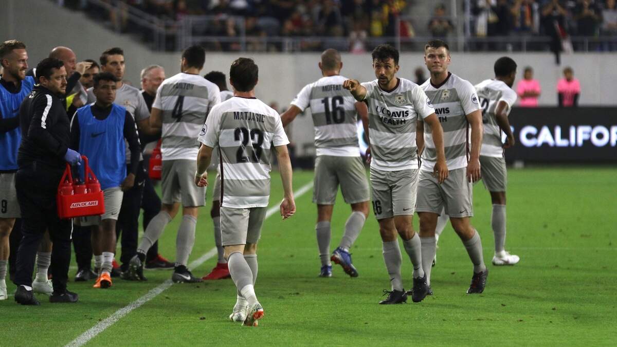 Republic FC players meet along the sideline during a Lamar Hunt U.S. Open Cup match against LAFC on Wednesday at Banc of California Stadium in Los Angeles.
