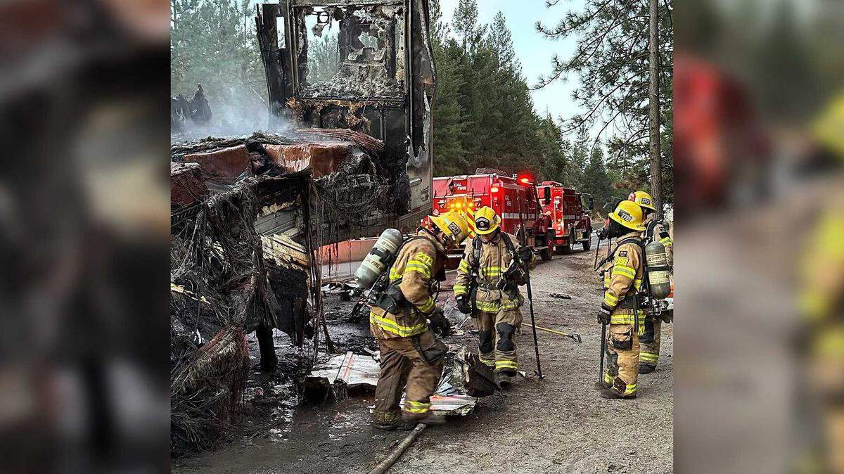 Firefighters mop up a trailer fire involving 40,000 pounds of chocolate on Interstate 80 a few miles north of Colfax on Monday, July 31, 2023. The cause of the fire is under investigation.