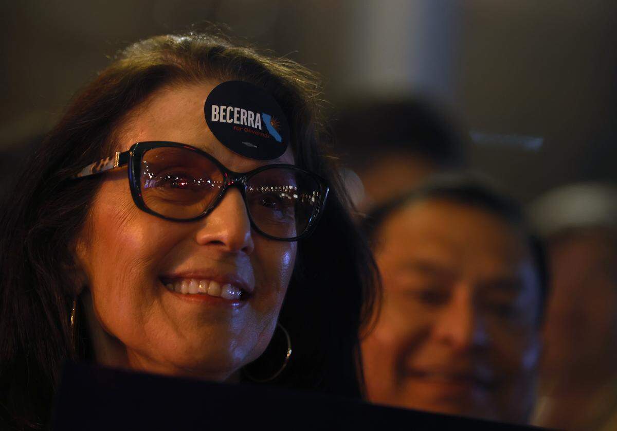 LOS ANGELES, CALIFORNIA - JUNE 02: A supporter of Democratic Gubernatorial candidate Xavier Becerra wears a campaign sticker on her forehead during his election night gathering at La Plaza de Cultura y Artes on June 02, 2026 in Los Angeles, California. Democratic Gubernatorial candidate Xavier Becerra will face Republican challenger Steve Hilton in the general election. (Photo by Justin Sullivan/Getty Images)