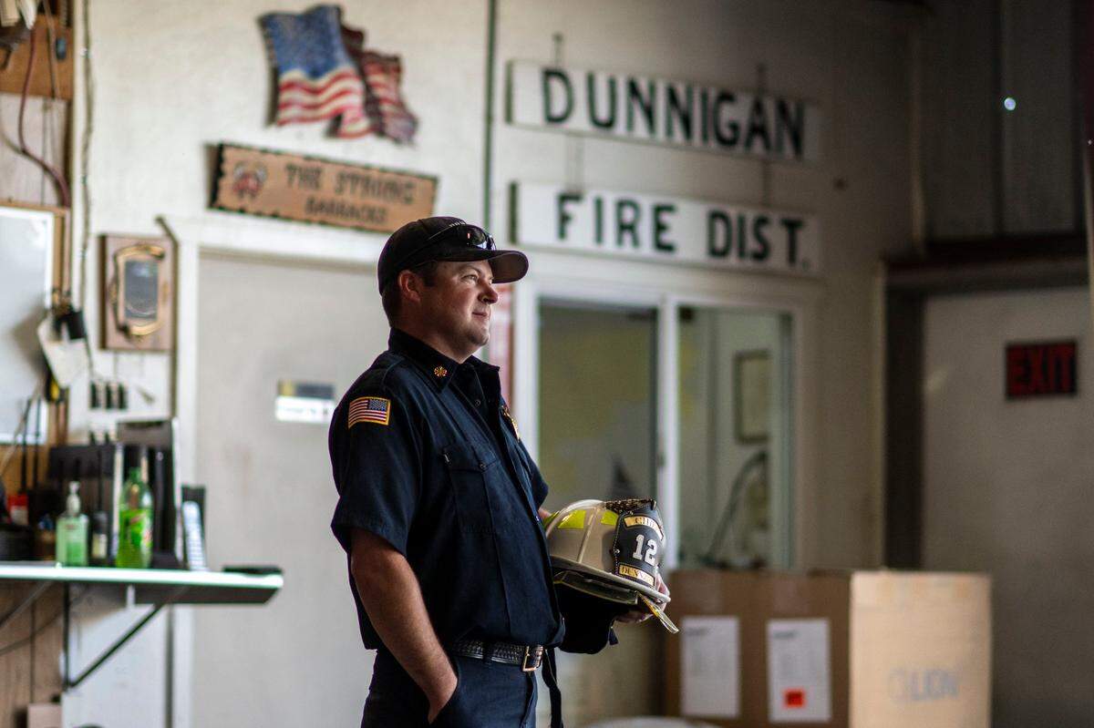 David Garrison, chief of Dunnigan Fire Protection District, stands in the station house in May. Garrison is concerned that his department may soon run out of funding.