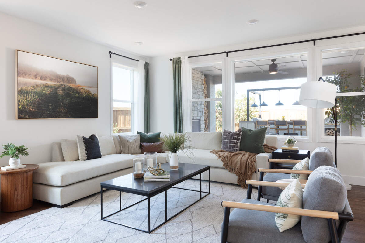 The living room of a model home at Mountaingate that was styled by TV personality Bobby Berk.