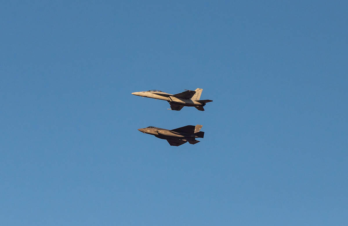 U.S. Navy pilot Lt. Matteo “Hog Sweat” Mezzetti, a Sacramento native, flies his FA-18 E/F Super Hornet, also known as the “Rhino,” above the Navy’s F-35C Lightning II during a first-of-its-kind pairing at the California Capital Airshow on Friday, Sept. 24, 2021, at Mather Airport in Sacramento.