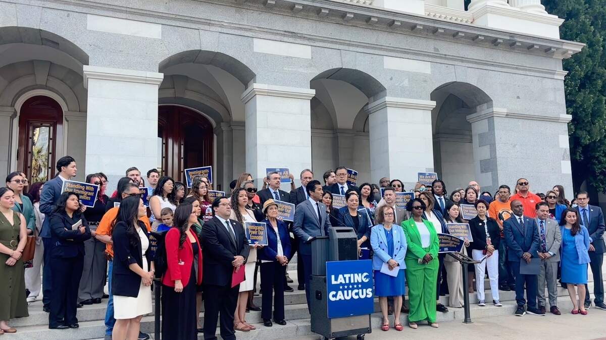Assembly Speaker Robert Rivas, D-Hollister, speaks in favor of SJR 9, a measure condemning federal mass immigration raids, on the west steps of the Capitol on Thursday, July 3, 2025. Rivas is surrounded by members of the Legislative Latino Caucus, other diversity caucuses, Capitol staffers and community organizers.
