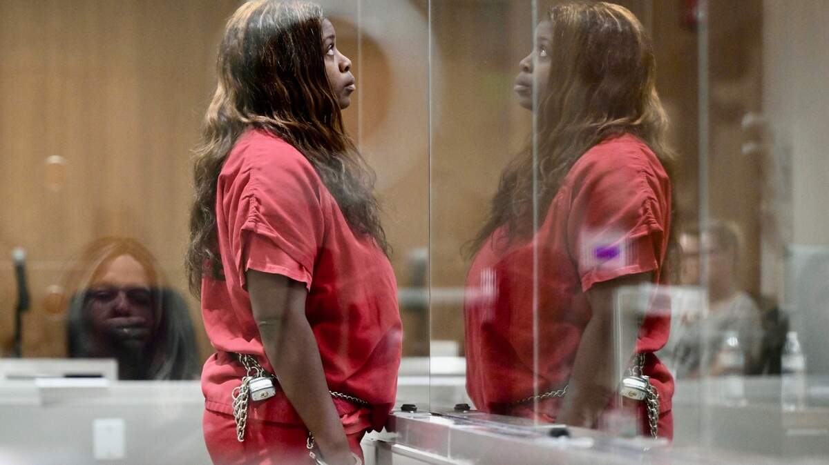 Schitara Page listens to the judge during her arraignment in Placer Superior Court on Wednesday for child cruelty charges in drowning death of twin toddlers.