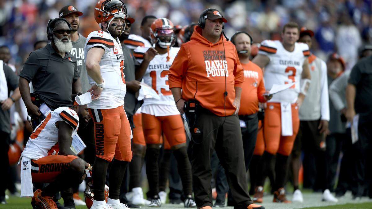 Cleveland Browns quarterback Baker Mayfield and head coach Freddie Kitchens watch during their game with Ravens last week.