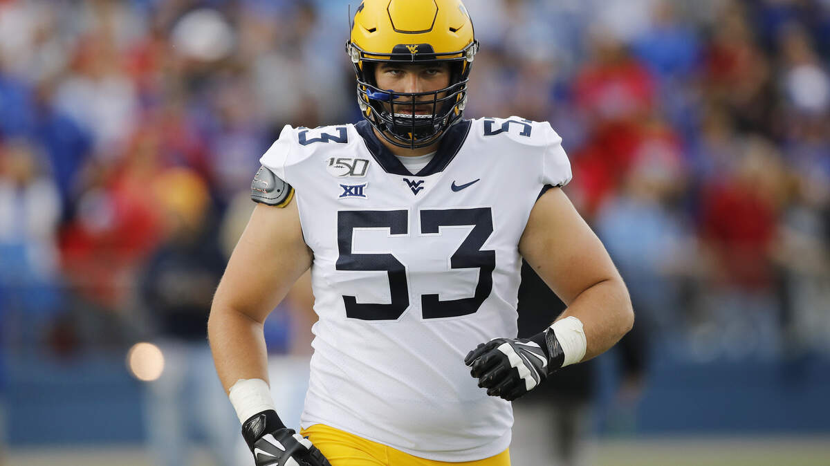 FILE - In this Sept. 21, 2019, file photo, West Virginia offensive lineman Colton McKivitz (53) is shown during an NCAA college football game against Kansas, in Lawrence, Kan. McKivitz was selected to The Associated Press All-Big 12 Conference team, Friday, Dec. 13, 2019. (AP Photo/Colin E. Braley, File)