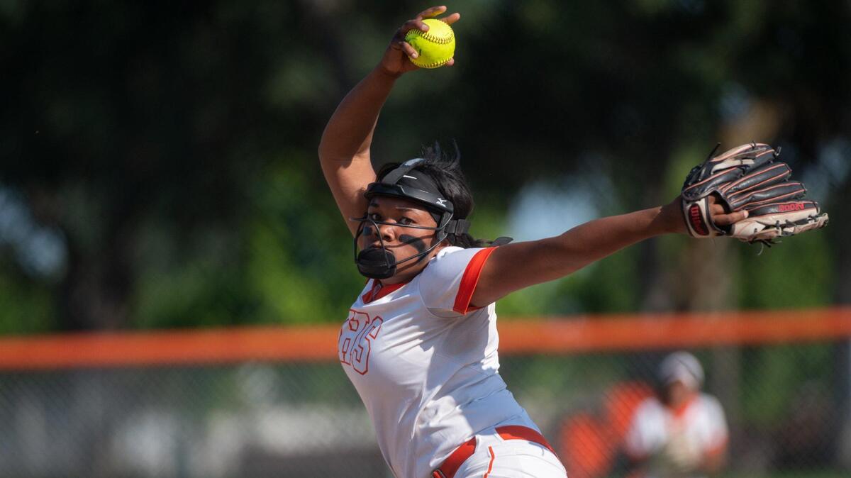 Roseville High School Tigers’ Malaya Johnson pitches against Woodcreek High School on Monday, April 25, 2022, at Roseville High School.