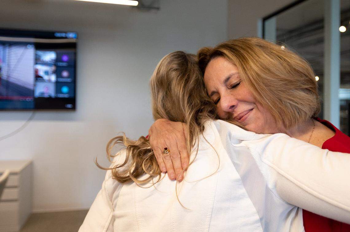 Sacramento Bee columnist Melinda Henneberger, right, hugs Bee Executive Editor Colleen McCain Nelson after winning the Pulitzer Prize for commentary on Monday in The Bee’s newsroom in Sacramento. Henneberger won for her work at The Kansas City Star, one of The Bee’s sister McClatchy publications, where she was hired by McCain Nelson in 2017.