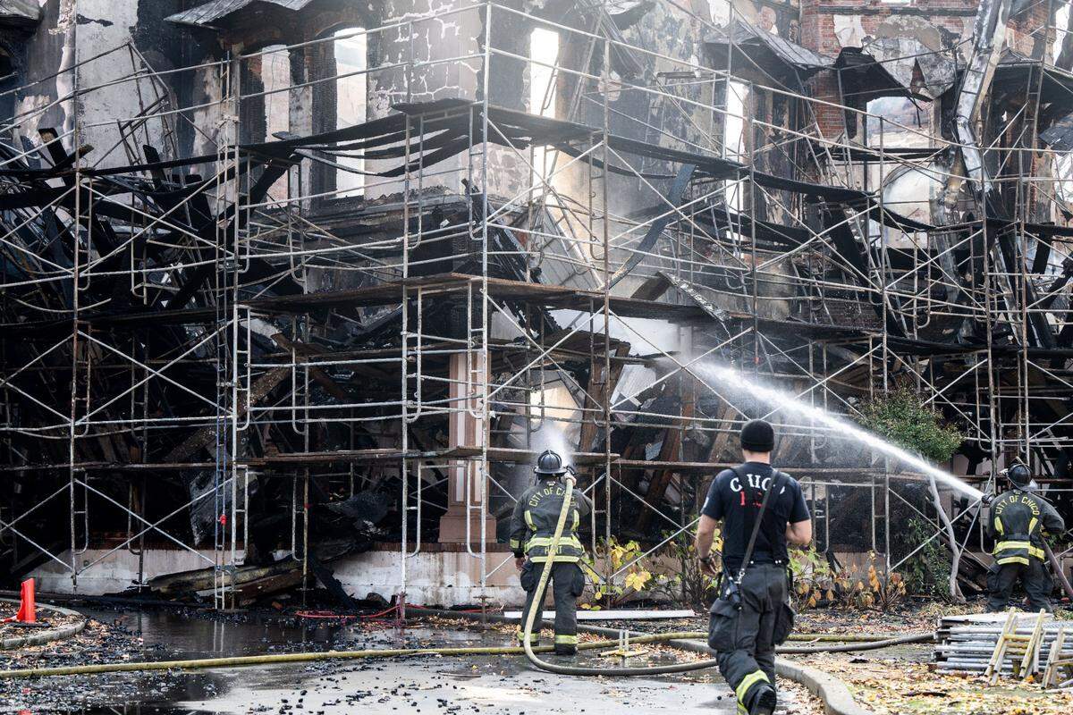 Chico firefighters put out hot spots after the historic Bidwell Mansion burned on Wednesday, Dec. 11, 2024.