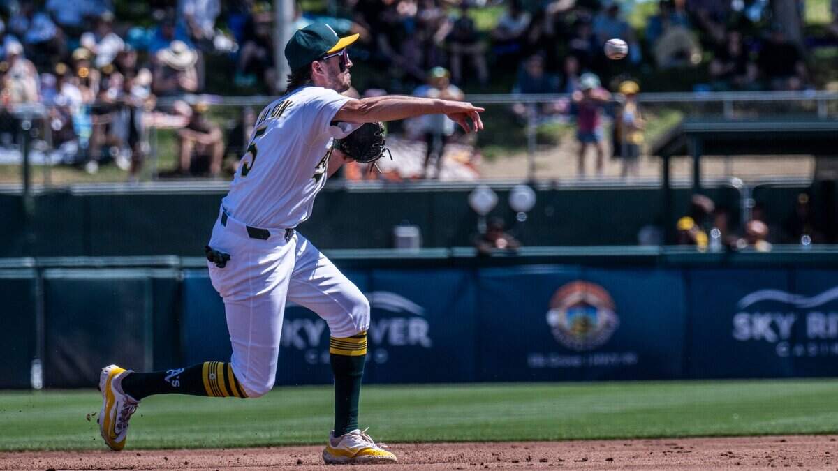 Athletics shortstop Jacob Wilson (5) makes a throw to first base during an MLB game against the San Diego Padres at Sutter Health Park in West Sacramento on Wednesday, April 9, 2025.