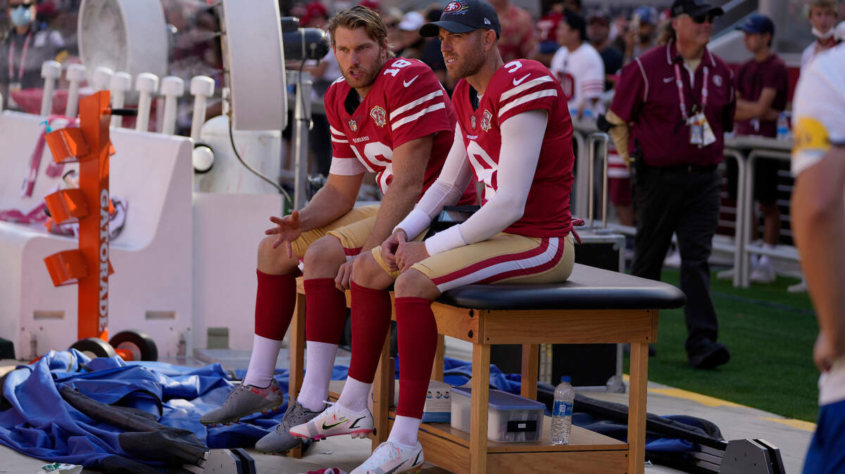San Francisco punter Mitch Wishnowsky, left, sits next to kicker Robbie Gould during Sunday’s 28-21 loss to the Seattle Seahawks.