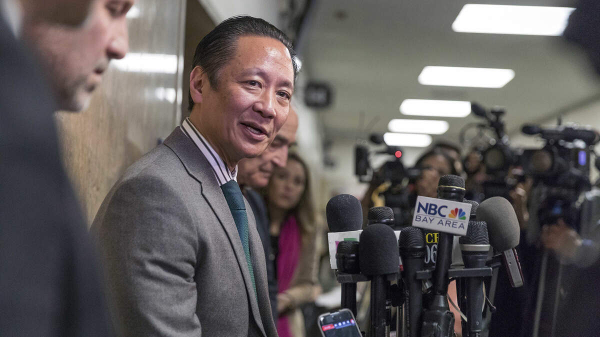 Public Defender Jeff Adachi speaks to reporters on Friday, Jan. 5, 2018, in San Francisco. A freelance journalist is vowing to protect his source after San Francisco police raided his home and office as part of a criminal investigation. Bryan Carmody tells the Los Angeles Times that officers handcuffed him Friday, May 10, 2019, as they confiscated items including his cell phone, computer and cameras. Authorities say the raid came during an ongoing probe into who leaked a confidential police report about the Feb. 22 death Adachi. (Jason Doiy/The Recorder via AP)