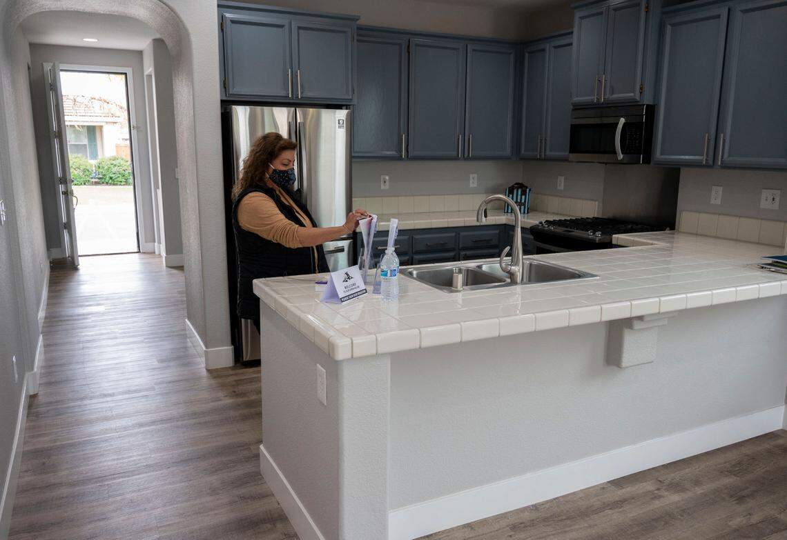 Realtor Kavita Jaisinghani with Lyon Real Estate holds an open house on Saturday, March 18, 2022, at a four bedroom home at 6036 Caddington Way in North Natomas listed at $599,000. The 1525 sq. ft. home has been on the market for about three weeks.