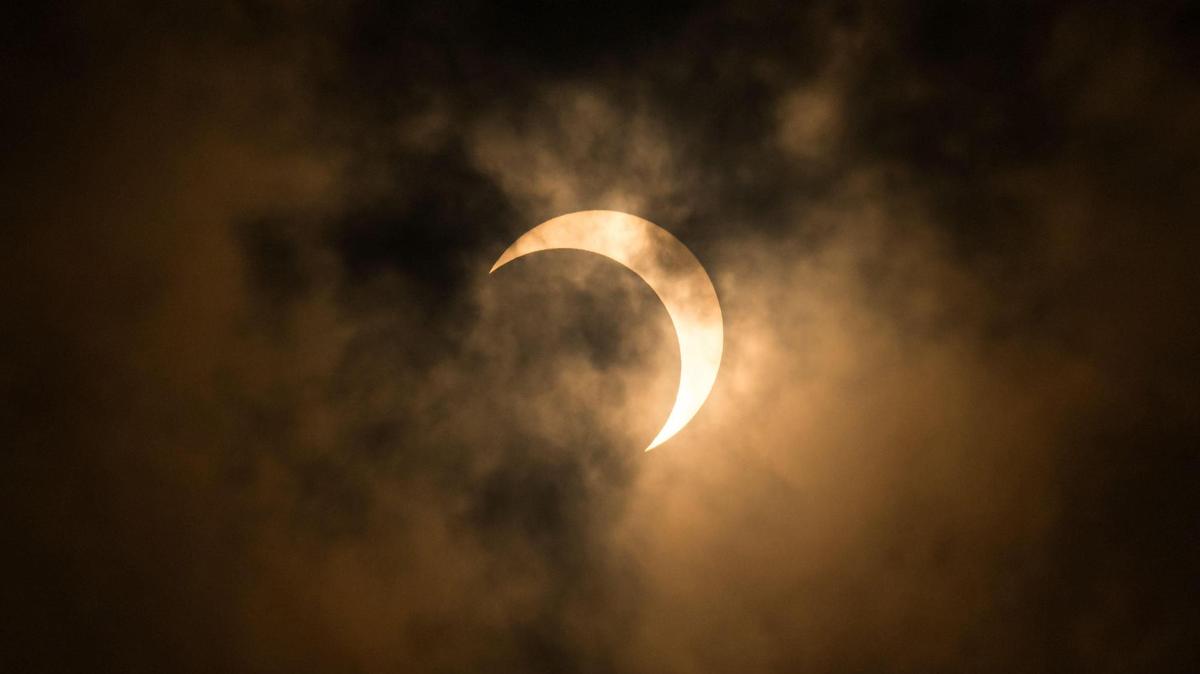 A rare annular solar eclipse is visible leaving its peak nearest “totality” on Oct. 14, 2023.