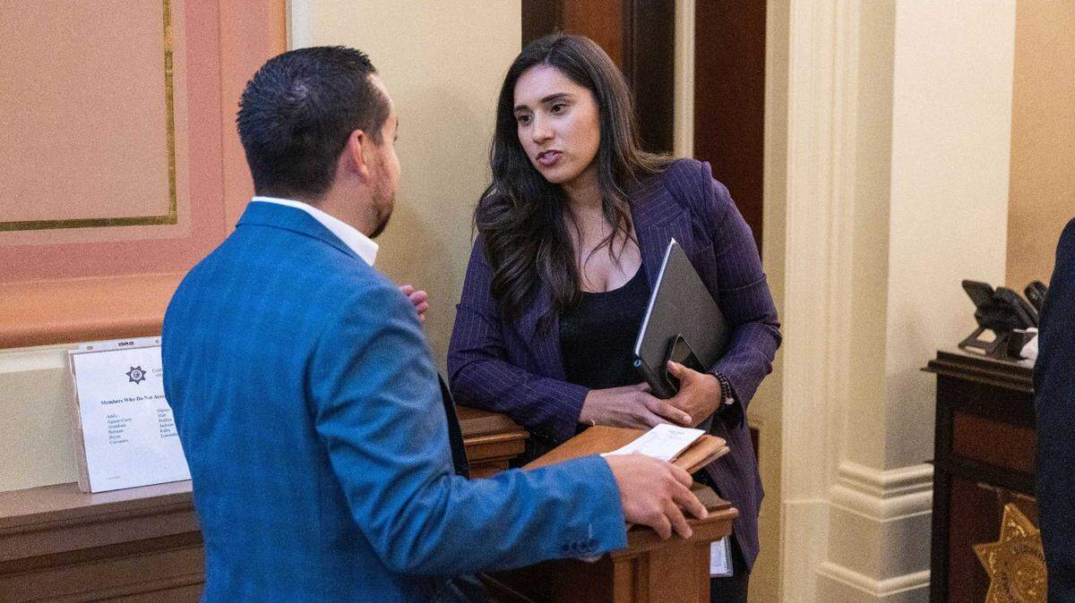 Then-Assemblywoman Sabrina Cervantes, D-Riverside, speaks to a lobbyist in 2023 at the state Capitol. Cervantes, now a state senator, was cited Monday on suspicion of driving under the influence following a vehicle collision in midtown Sacramento.