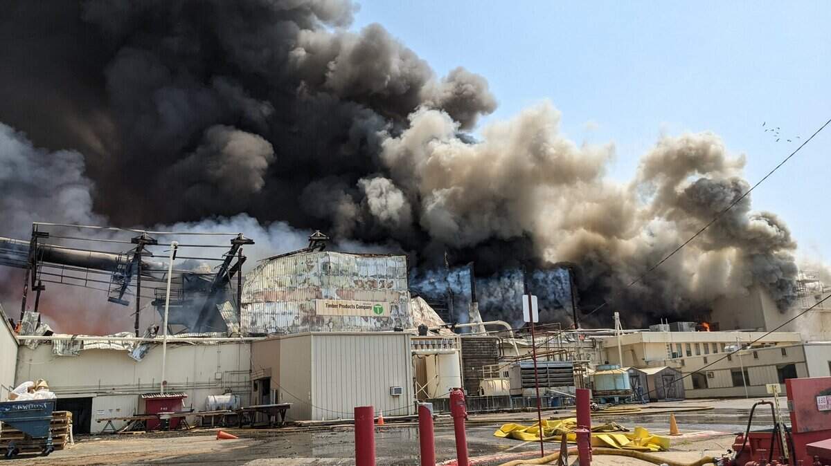 The Ampine facility, a timber processing company in Martell, Calif., became fully engulfed in flames Monday, July 25, 2022, Cal Fire officials said. The fire spread to vegetation.