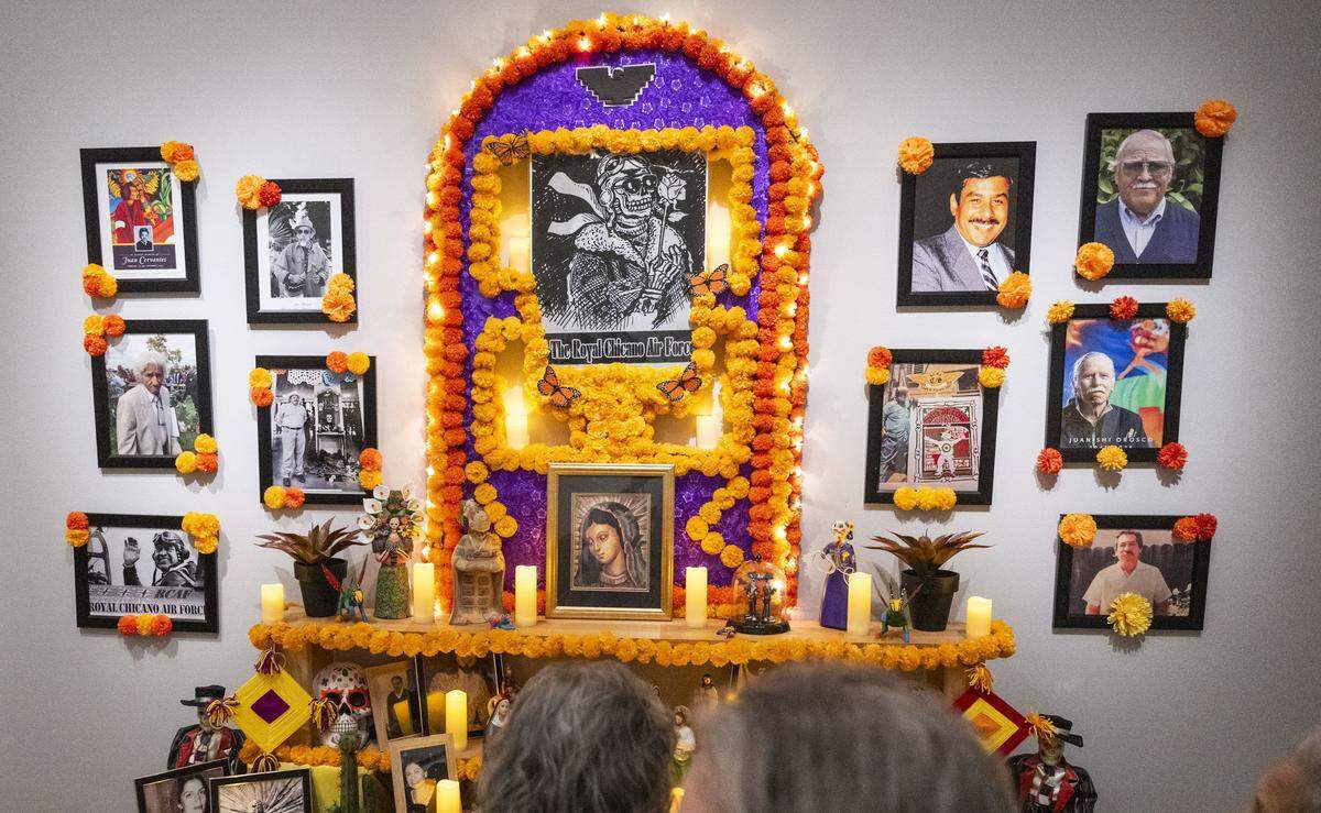 An alter in honor of some of the late Royal Chicano Air Force members at the “Rebels With La Causa: Royal Chicano Air Force Art and Activism, 1970-1990,” exhibit at the Crocker Art Museum on Friday, Feb. 20, 2026. 