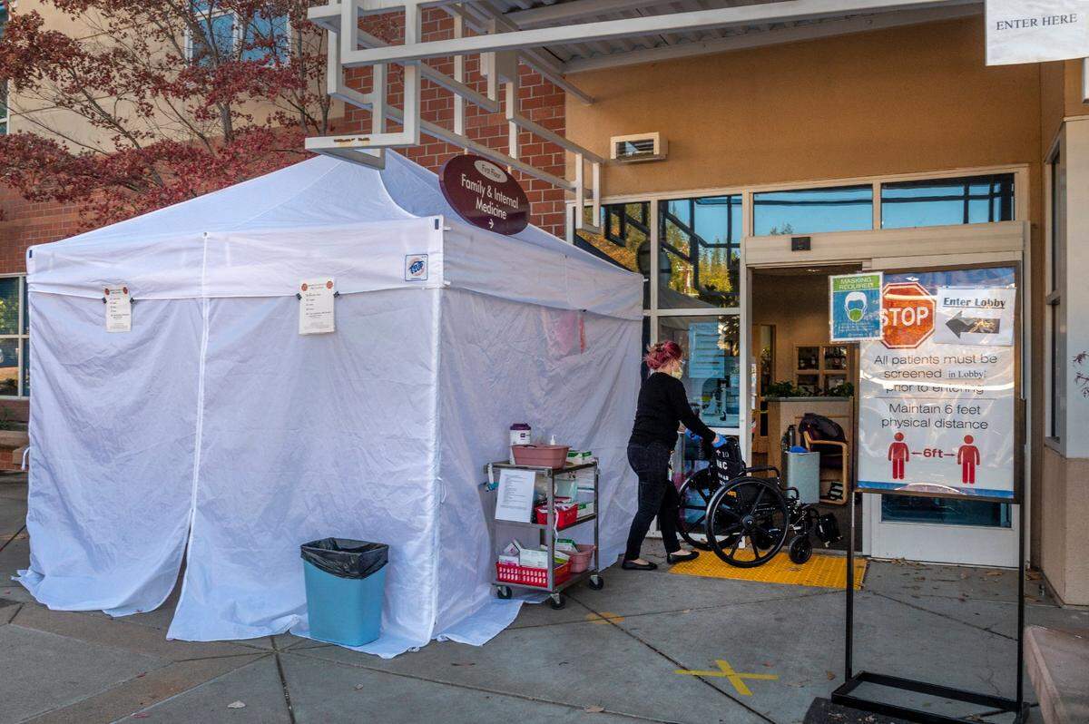 A tent that is used to examine patients who may have COVID-19 outside of Marshall Medical Center’s hospital in Placerville on Wednesday, Dec. 2.