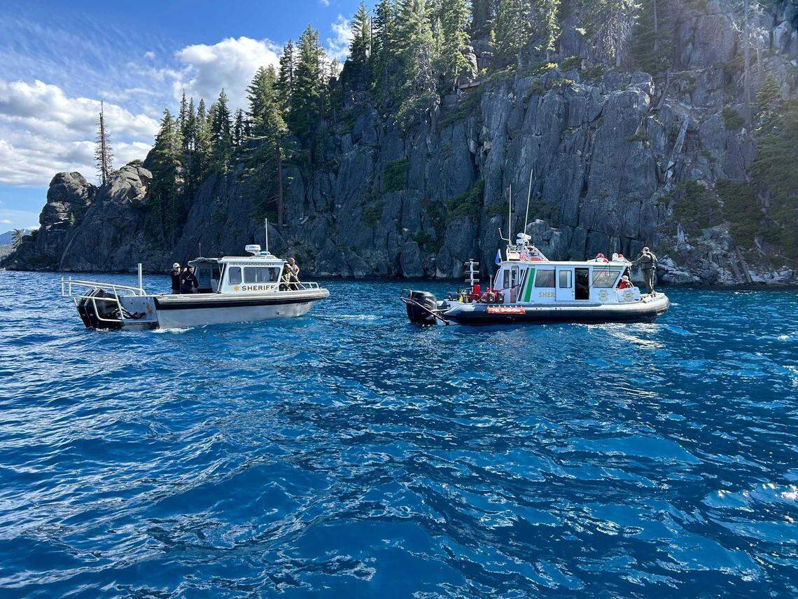 Patrol boats from the Washoe and El Dorado county sheriff’s offices search June 22, 2025, for two boaters who went missing after a capsizing near D.L. Bliss State Park. Crews used sonar and a remotely operated vehicle after a 27-foot Chris-Craft boat capsized during a sudden thunderstorm the previous afternoon.
