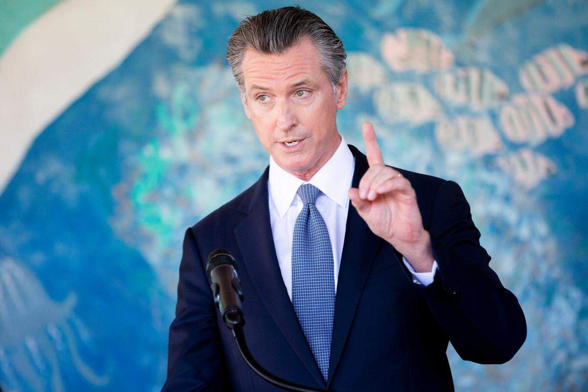 California Gov. Gavin Newsom speaks during a news conference at Carl B. Munck Elementary School, Wednesday, Aug. 11, 2021, in Oakland, Calif. Gov. Newsom announced that California will require its 320,000 teachers and school employees to be vaccinated against the novel coronavirus or submit to weekly COVID-19 testing. The statewide vaccine mandate for K-12 educators comes as schools return from summer break amid growing concerns of the highly contagious delta variant. (Santiago Mejia/San Francisco Chronicle via AP, Pool)