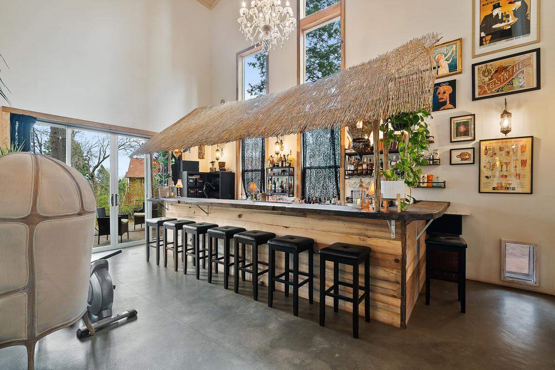 A bar seats at least eight people at a home recently listed for sale in Nevada City on Banner Lava Cap Road.